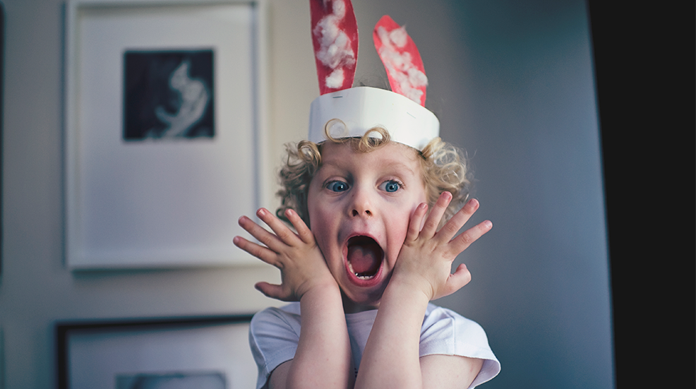 Super sweet kid with a homemade easter bunny head piece